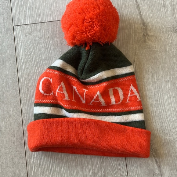 NWOT AUTHENTIC CANADA GOOSE 100% MERINO WOOL SKI BEANIE CLASSIC STYLE ORANGE/WHT - Picture 3 of 10